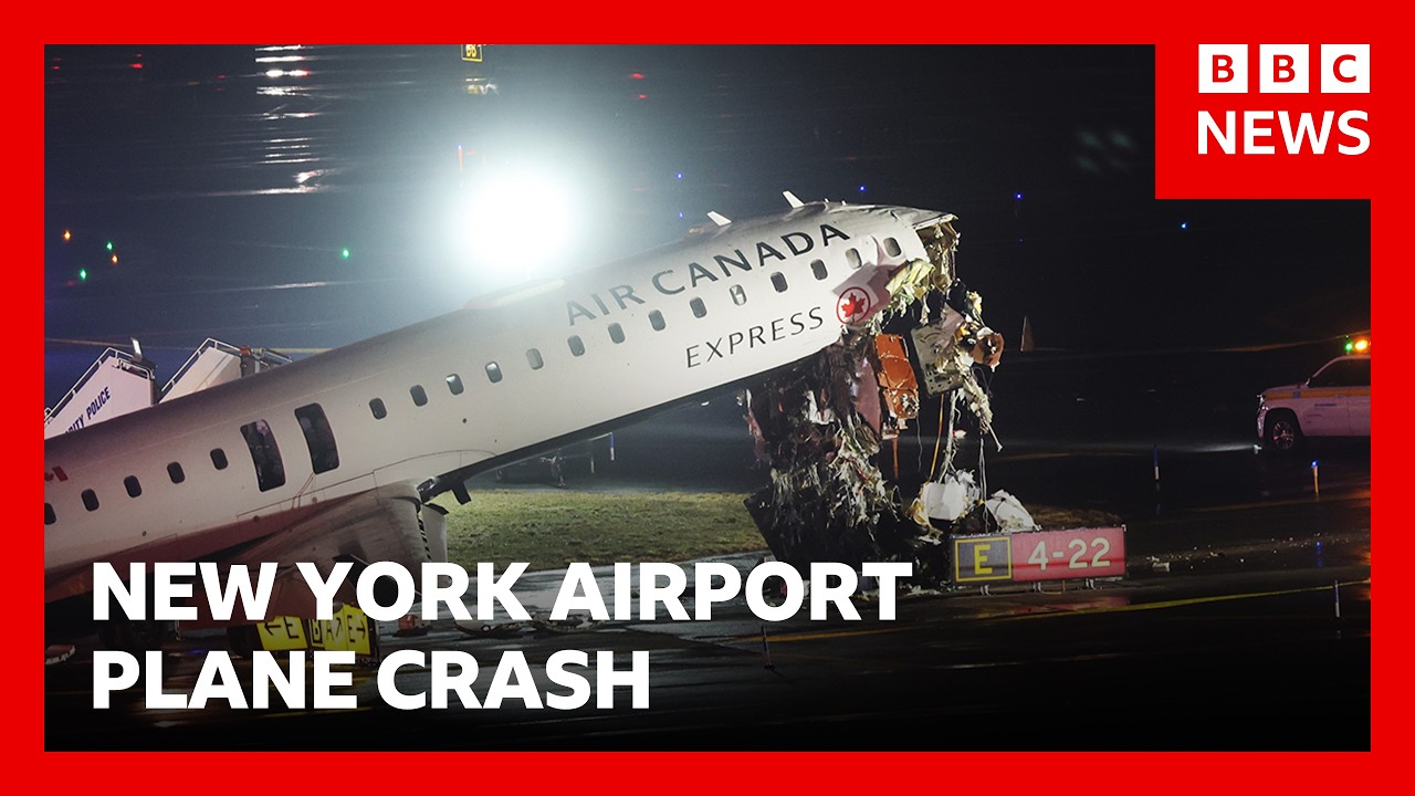 Two pilots killed after plane and ground vehicle collide at New York's LaGuardia Airport | BBC News
