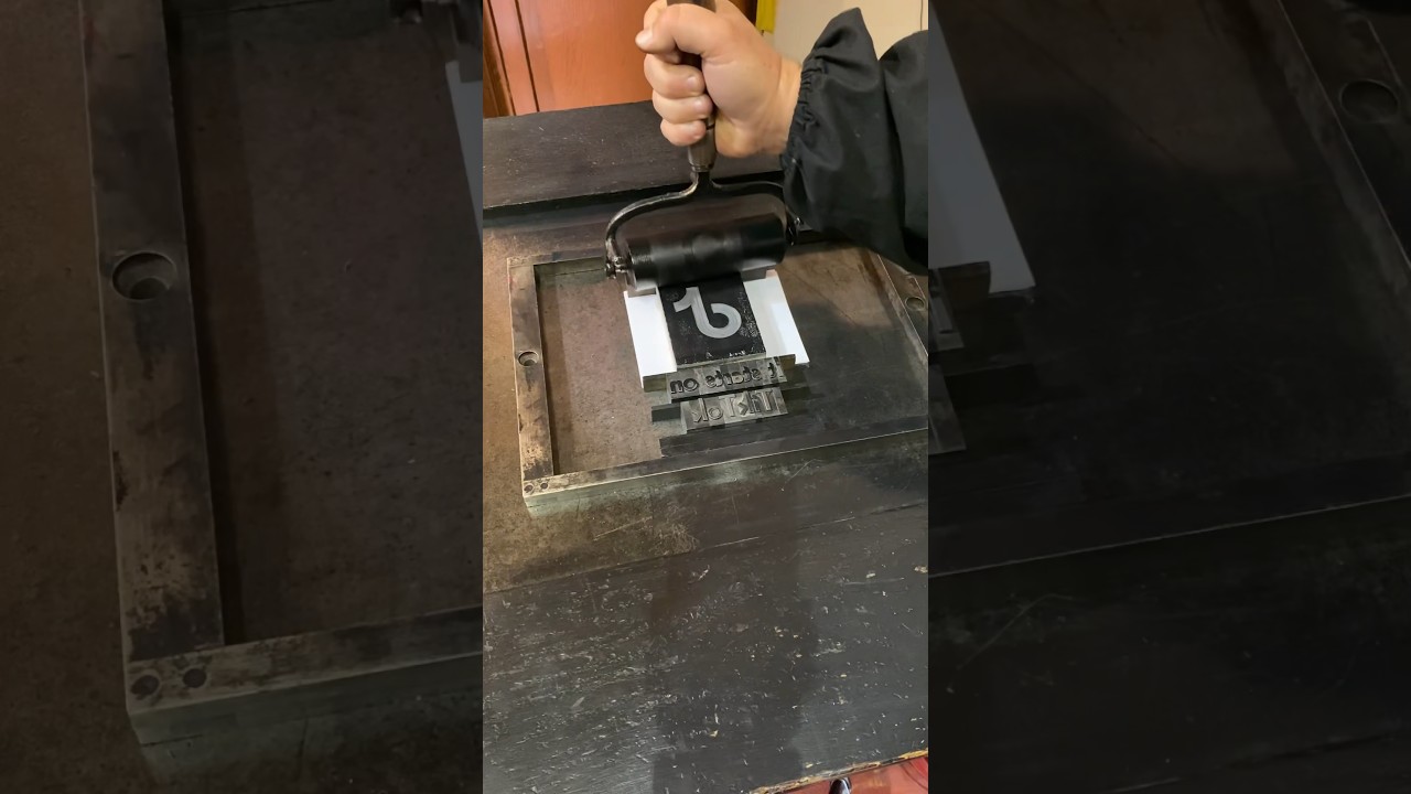 Letterpress printing our new TikTok linocut