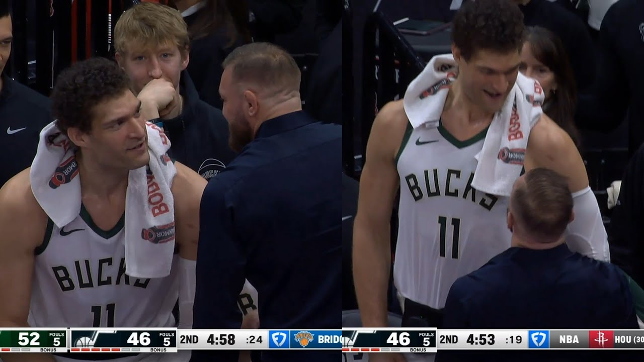 Conor McGregor sizing up Brook Lopez on the Bucks bench 😂