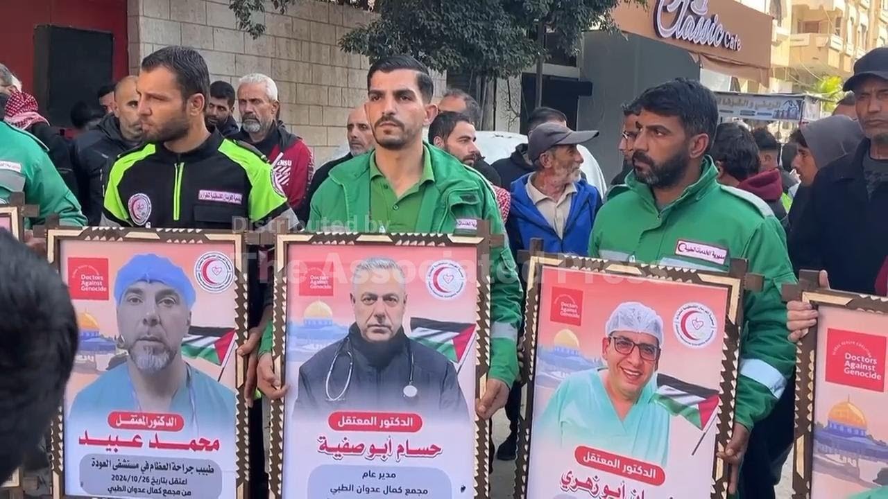 Relatives of prisoners held in Israeli jails demonstrate near Red Cross demanding their release