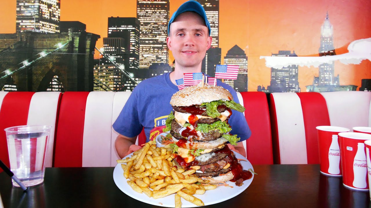 A Restaurant In Belgium Pays $100 Cash If You Break The 9-Layer Burger Challenge Record!