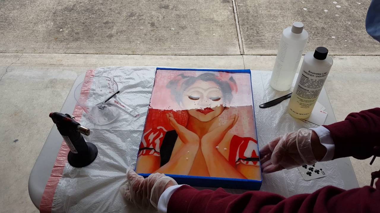 Pouring resin on a painting
