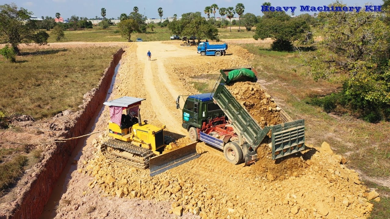 Incredible KOMATSU D20P Dozer Working Pushing Soil Build New Road And Mini Dump Truck Unloading Soil