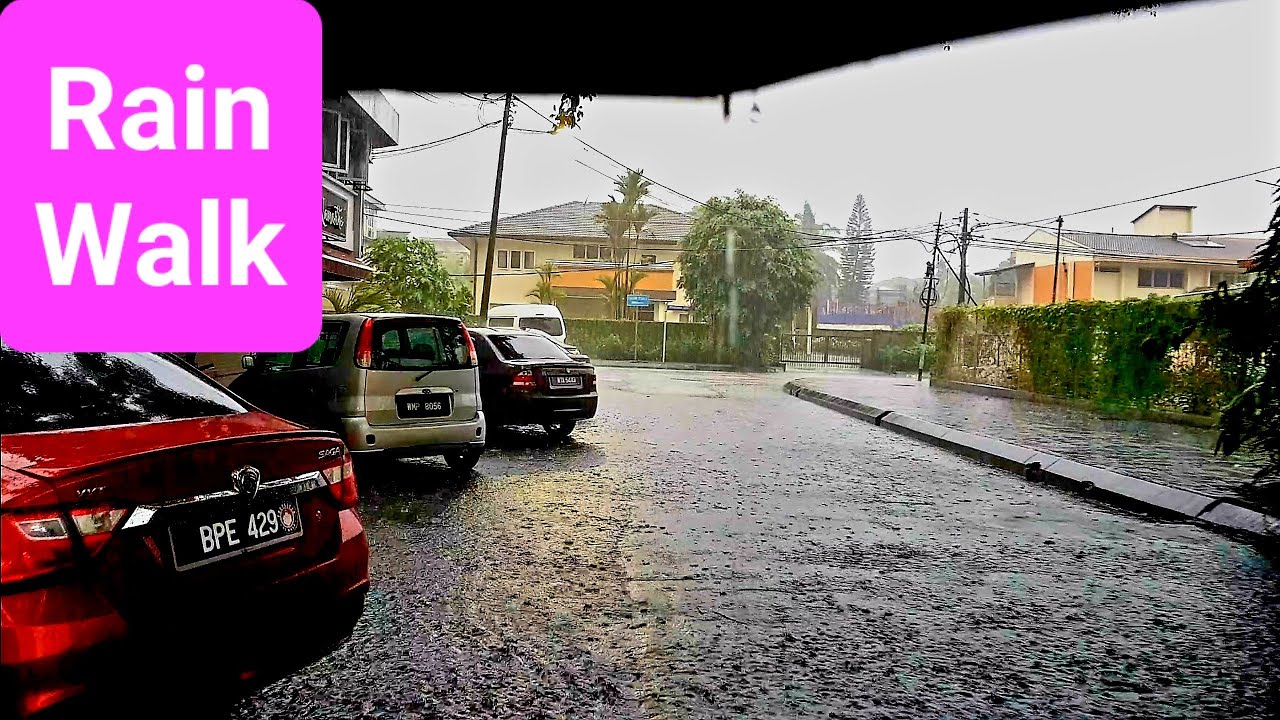 Walking in the Rain (Vid-49) at Jalan Ampang Hilir in Kuala Lumpur, Malaysia.