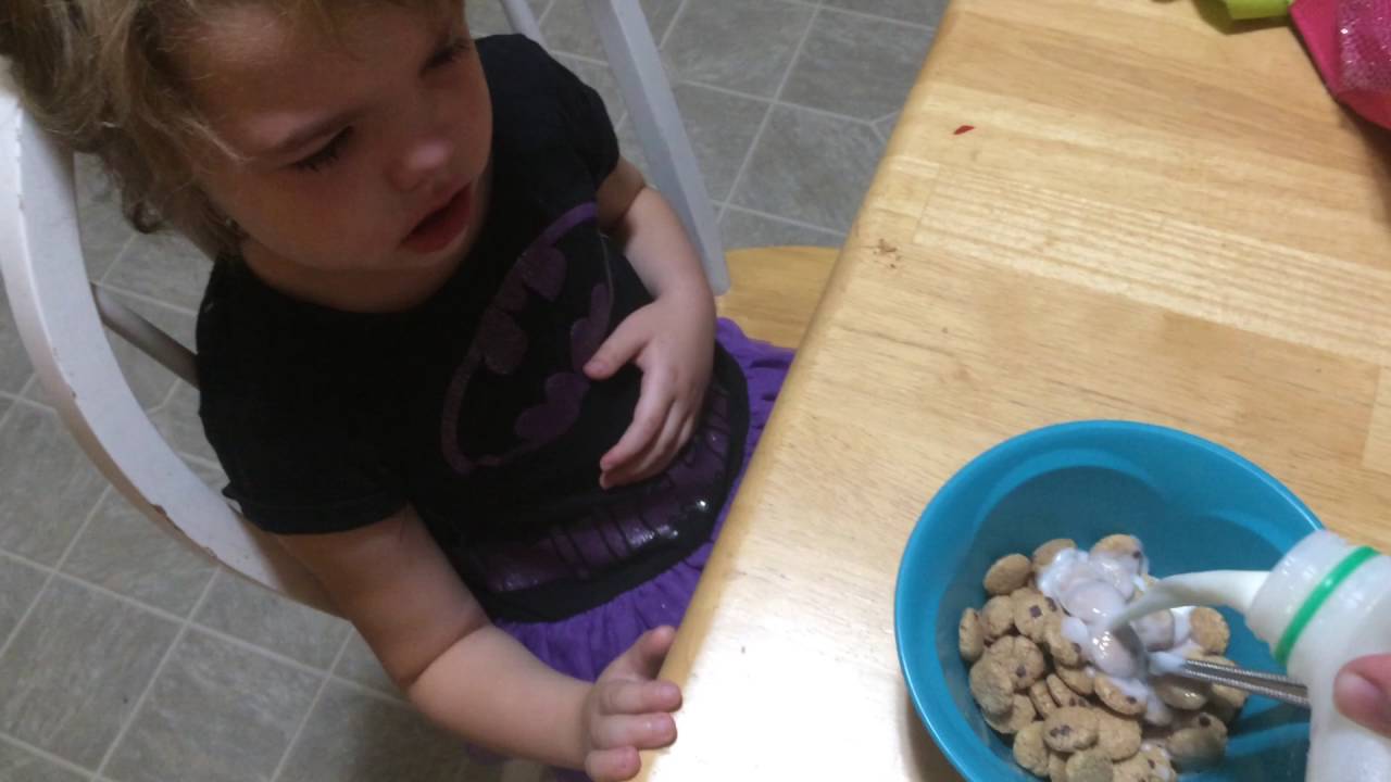 Girl doesn't want to eat breakfast.