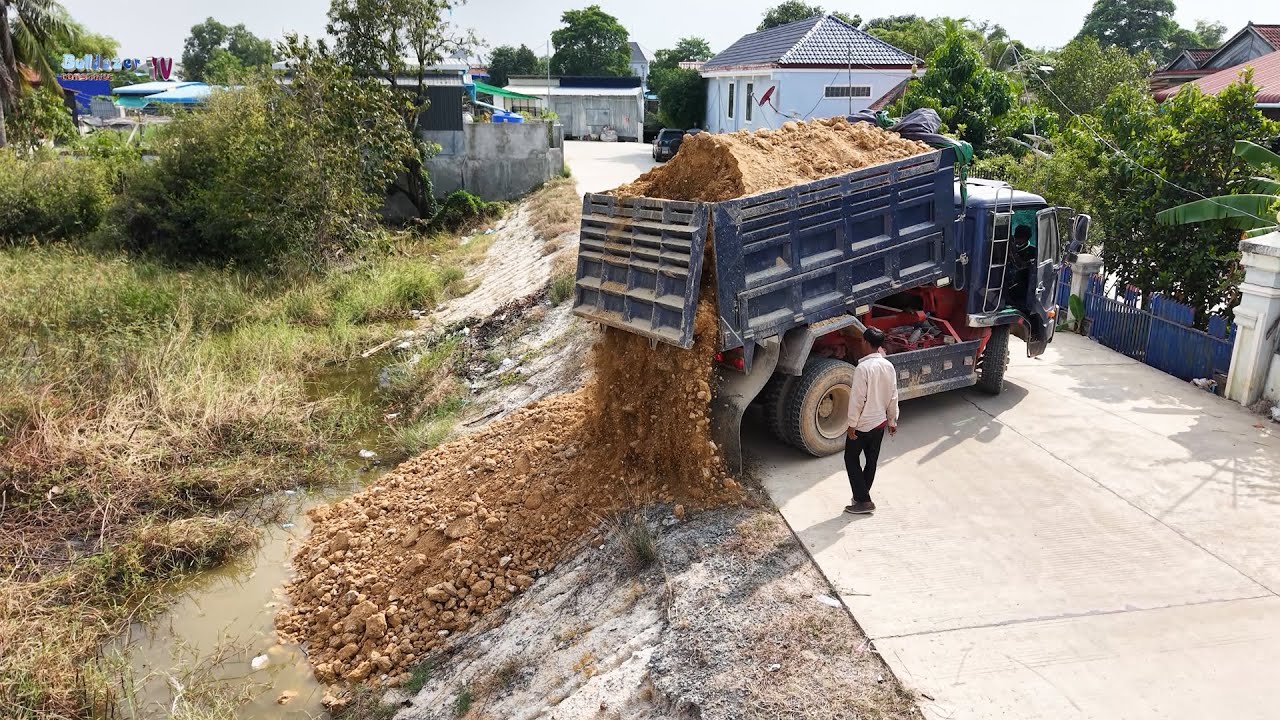 Wonderful Start Landfill Task! Filling Low Land Using Bulldozer Push Soils With Trucks Dumping