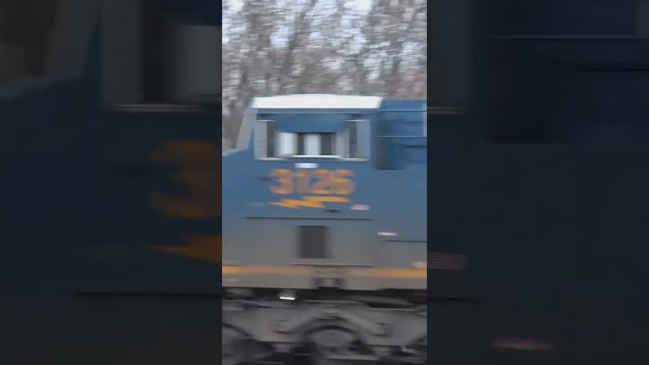 Dueling train horns with cool train meet at at railroad crossing.