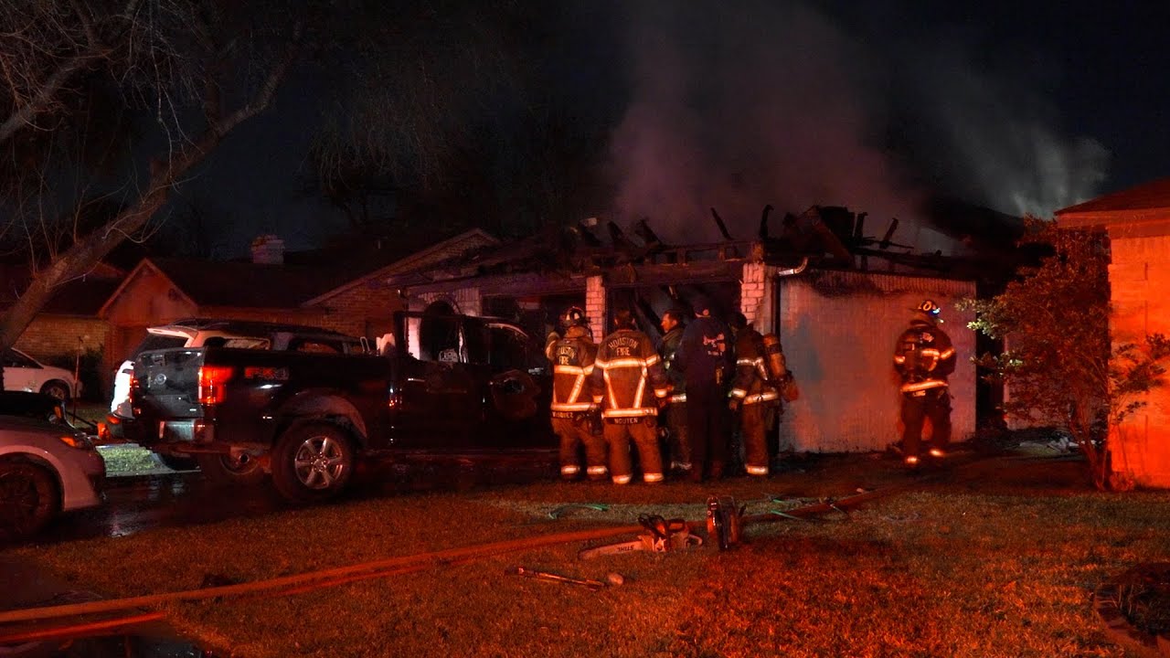 Two transported after fire possibly spreads from vehicle to home in southwest Houston