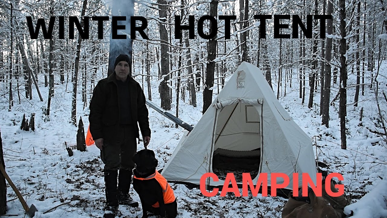 Winter hot tent camping in a Snowtrekker hot tent with my dog