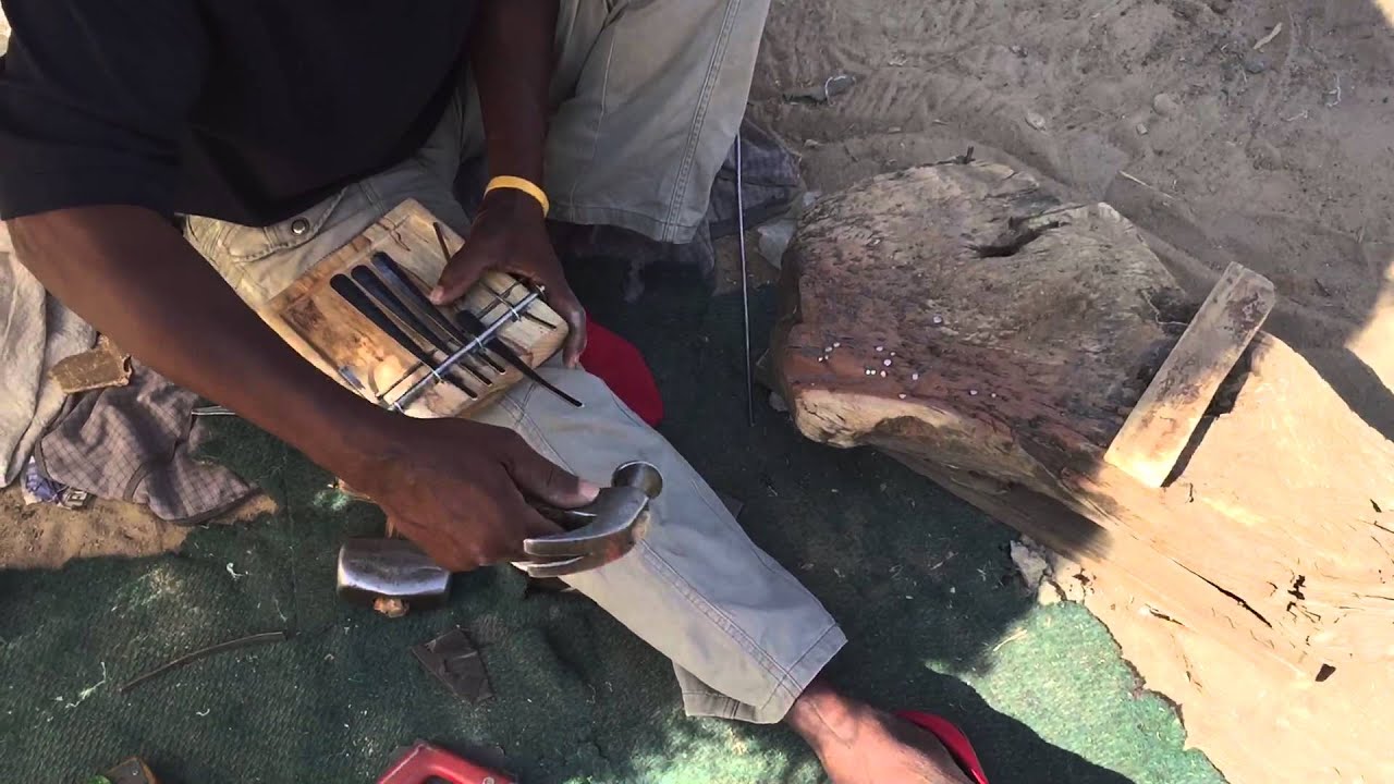 Matemai (aka Newton Cheza Chozengwa) making one mbira key