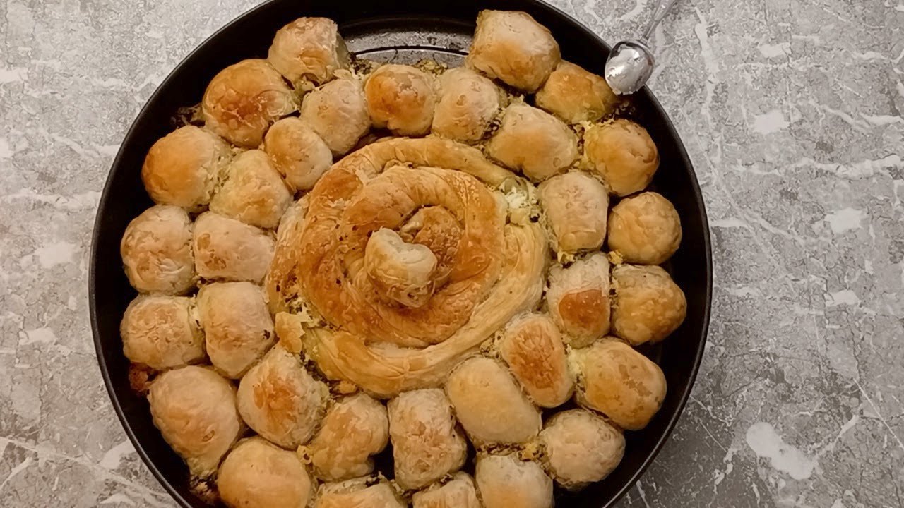 بورك جبن على شكل بقلاوة مورق وسهل والاهم لذيذ