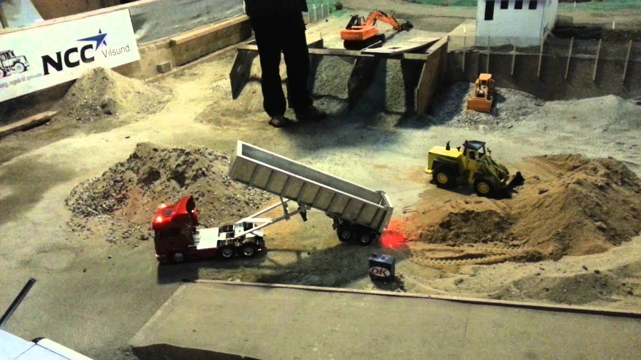 Rc lorry unloading sand.