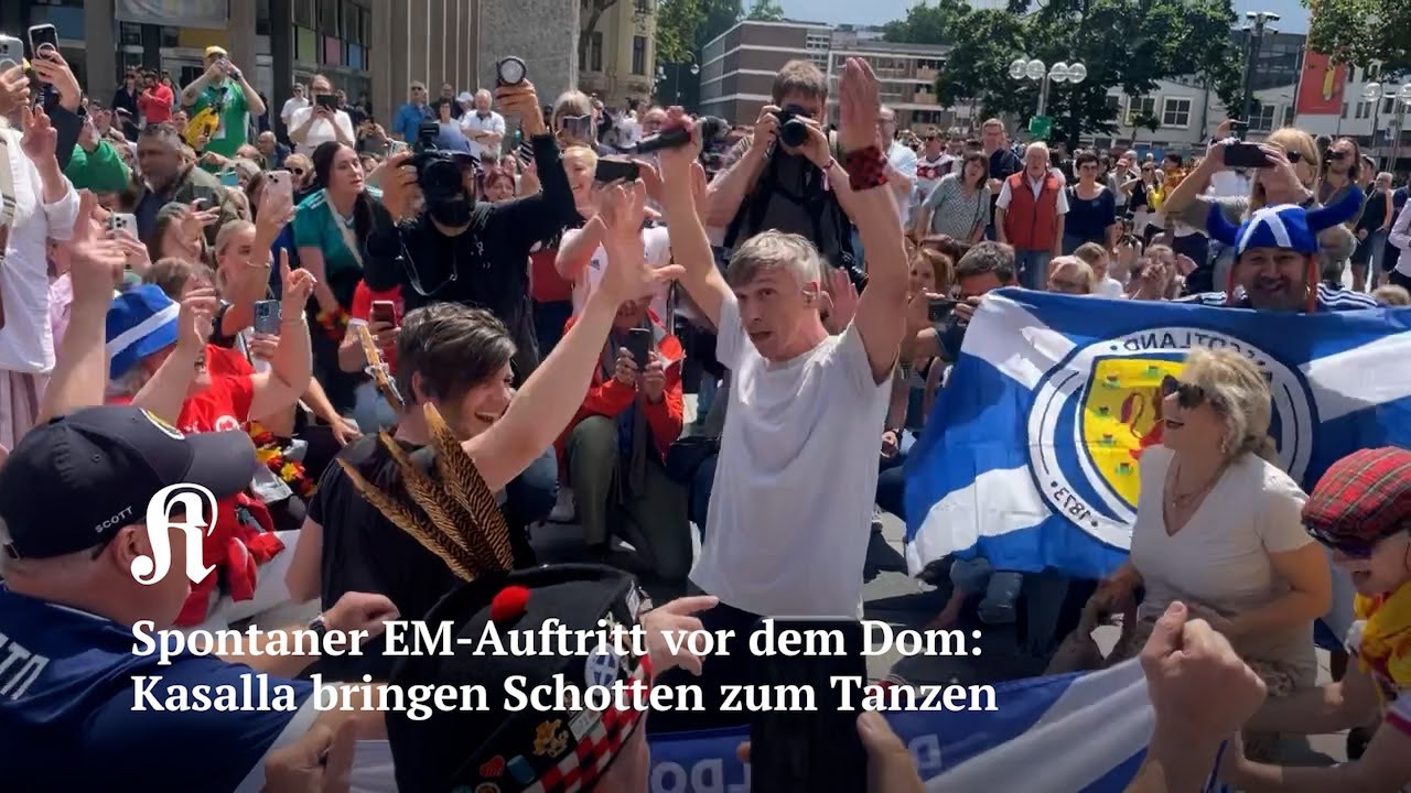 Spontaner EM-Auftritt vor dem Dom: Kasalla bringen Schotten zum Tanzen