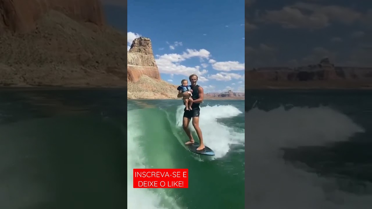 CRIAN&Ccedil;A SURFANDO COM O PAI.