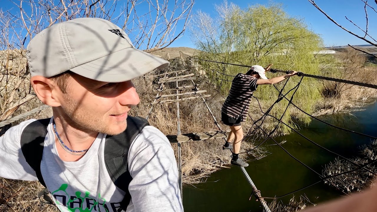 SKETCHY BROKEN BRIDGE CROSSING