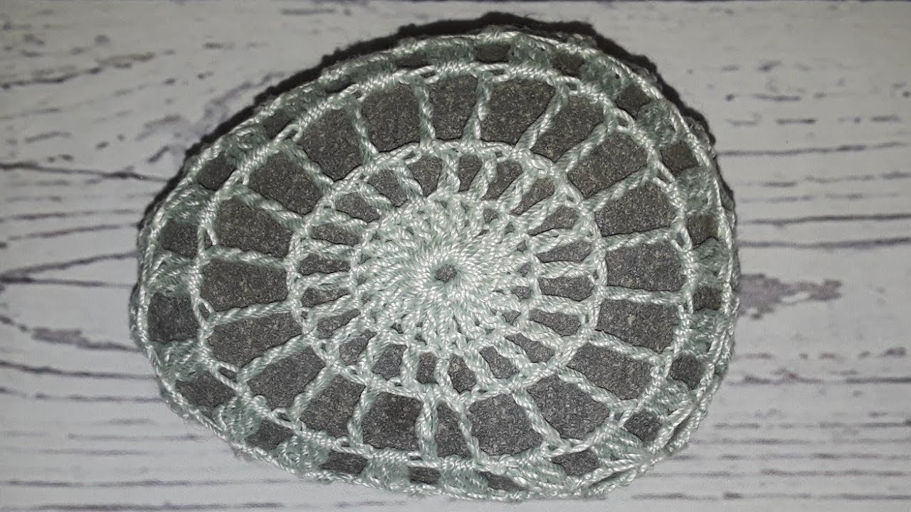 How to crochet around a rock.  Yarn bombing