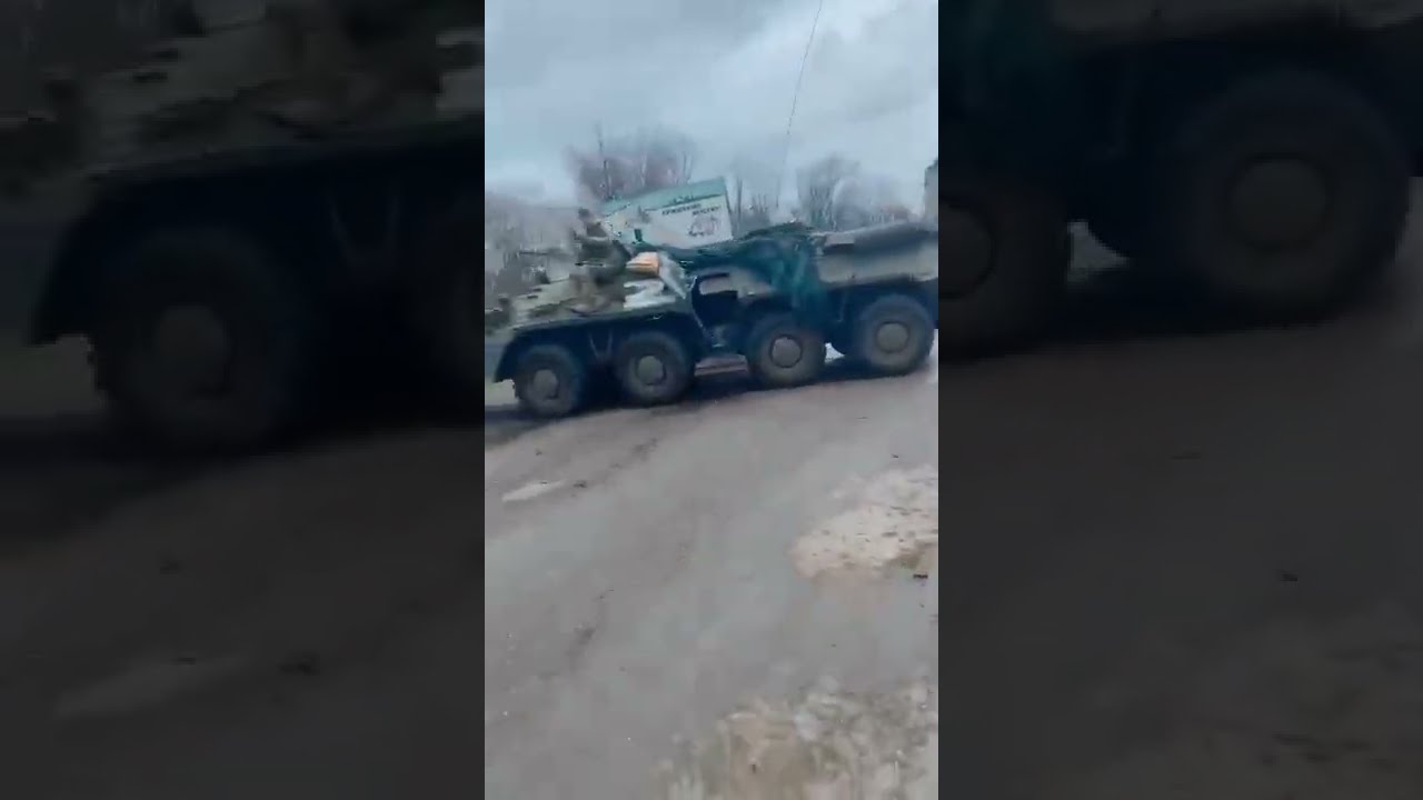 Ukrainians driving off with captured BTR-80