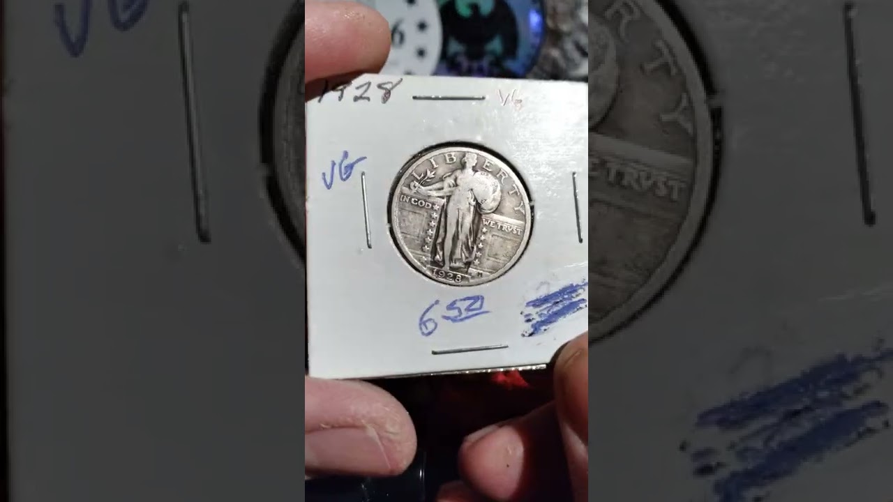 1928 Standing Liberty quarter at VG-8 or so grade.