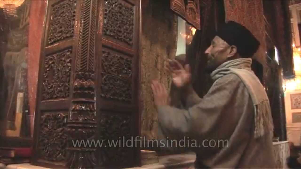 Devotees offering prayers Makhdoom Sahib Shrine