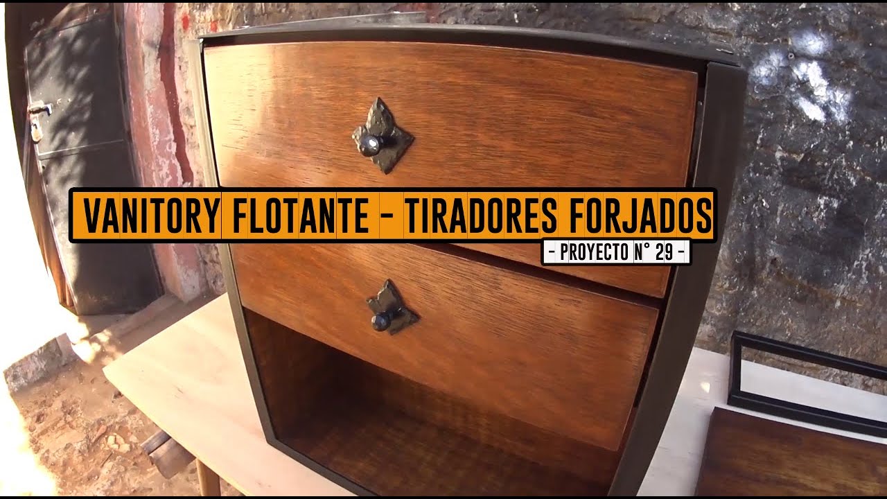 Vanitory flotante – Tiradores forjados.
