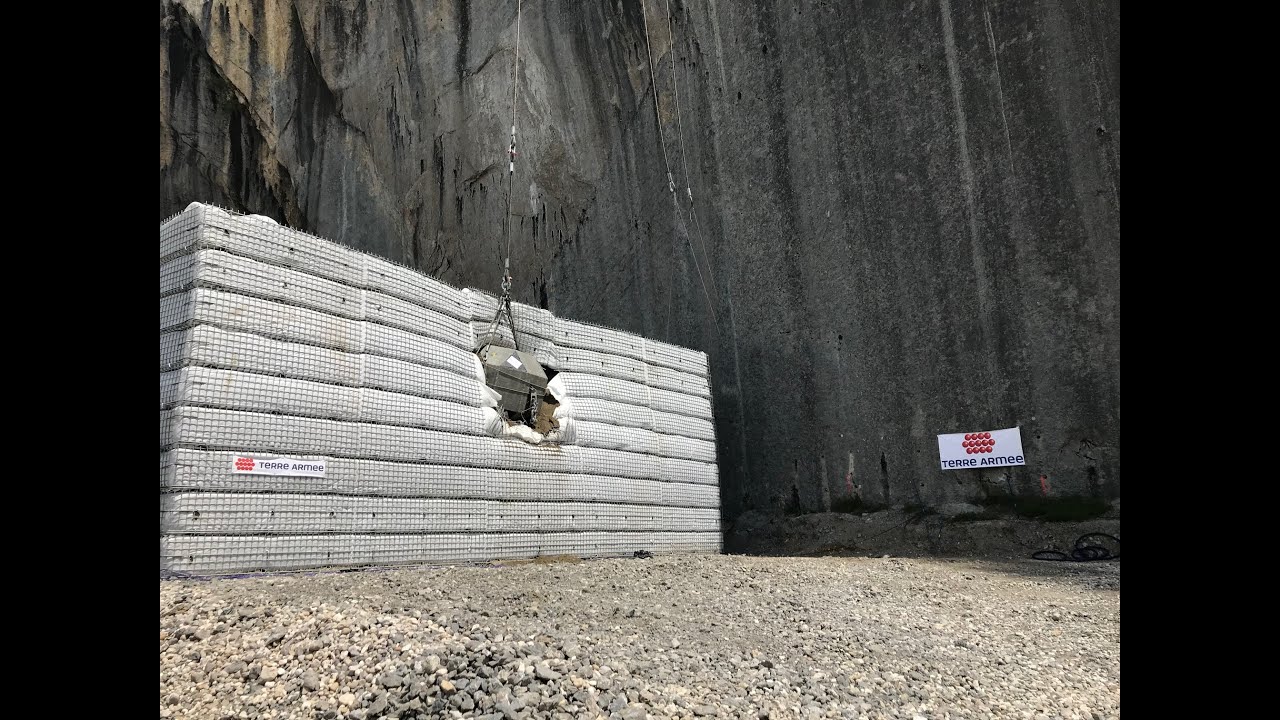World-record impact on Reinforced Earth® rockfall bund: Slender footprint for protective structures