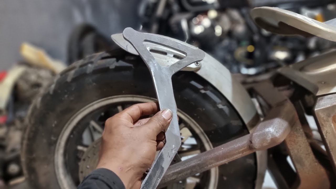 how this aluminum biled is turned into a rear fender support