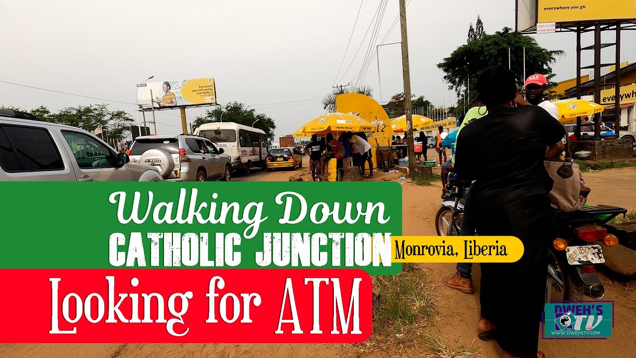 Liberia Banks are the WORSE:  Walking Down Catholic Junction - Looking for ATM