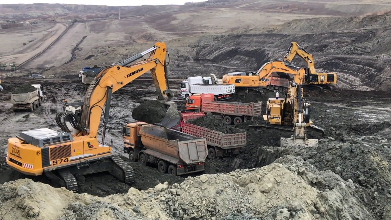 Liebherr And Caterpillar Excavators Loading Trucks On Coal Mines - Sotiriadis/Labrianidis Mining