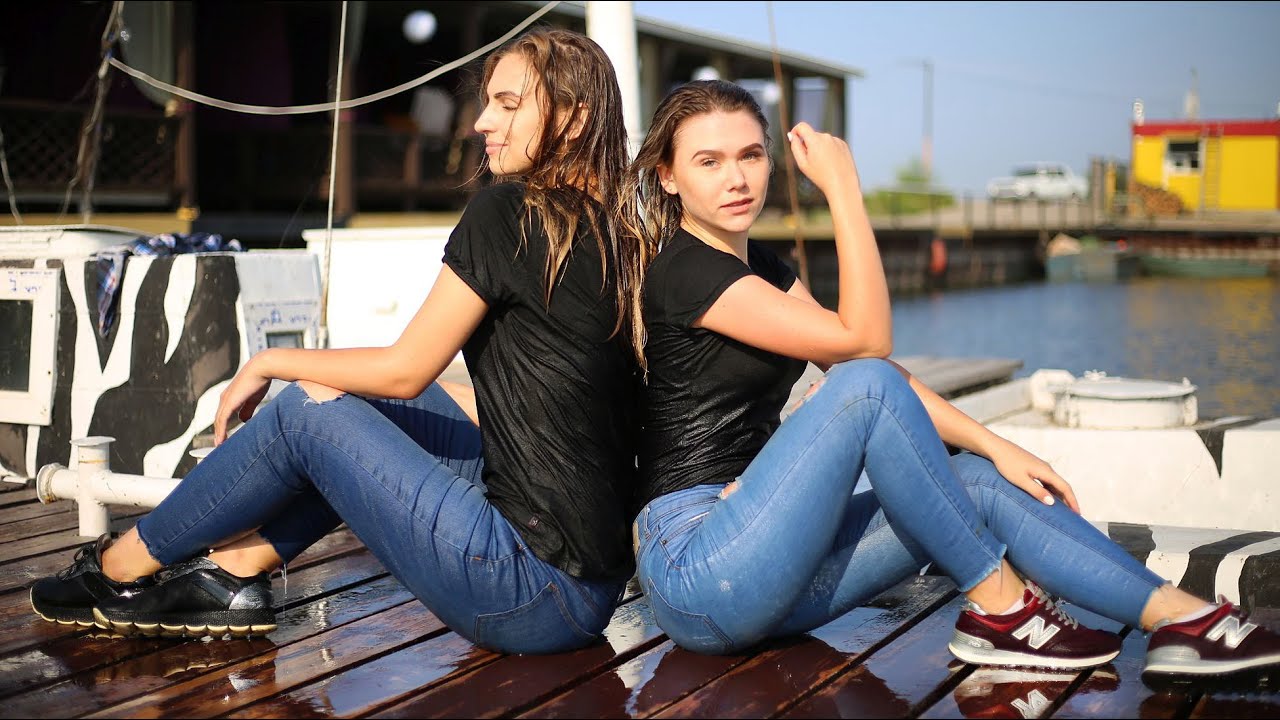WET AND STYLISH: PRETTY GIRLS POSE COOLLY BY THE RIVER IN WET CLOTHES [WETLOOKER ID: vk2419]