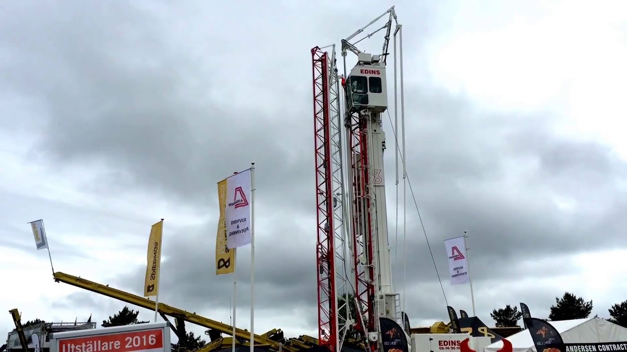 Spierings SK 597-AT4 mobile tower crane unfolding.. 48m jib