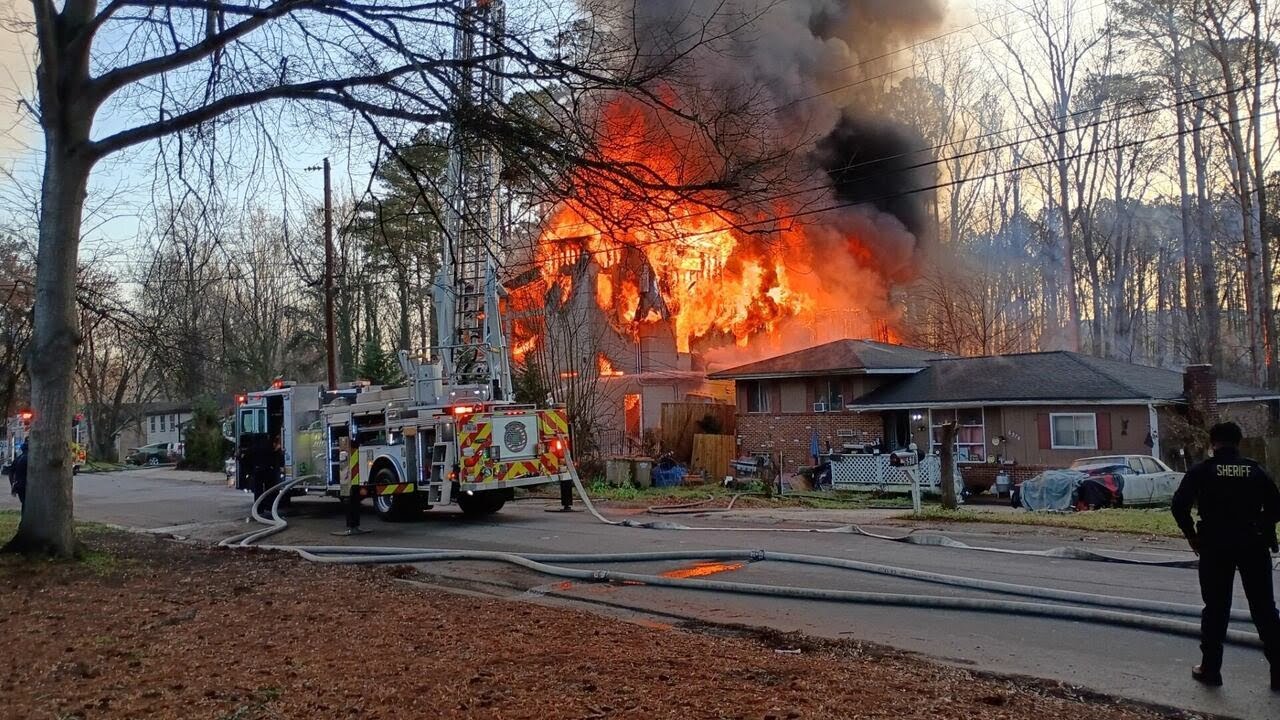 Firefighters battle massive flames from home in Clayton County