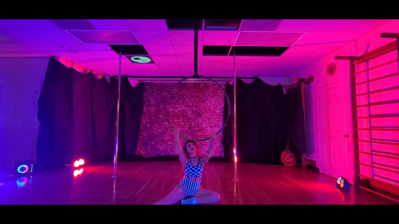 Dark flow aerial hoop routine