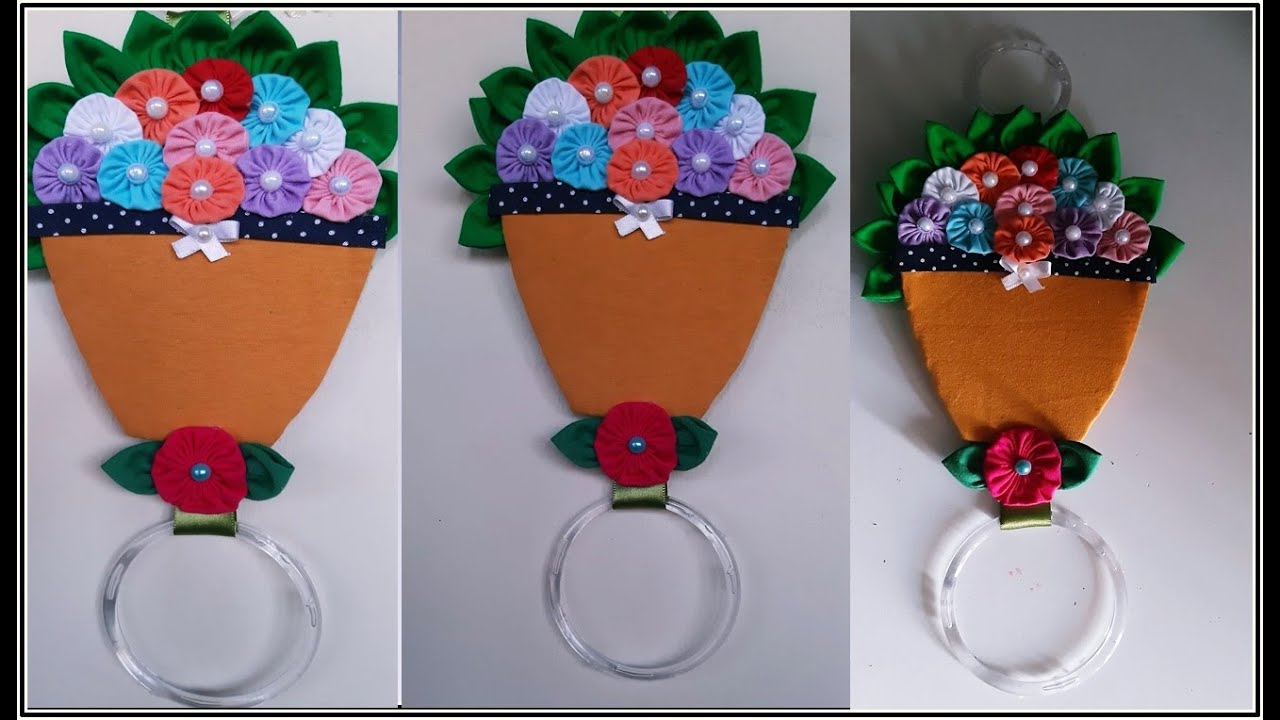 PORTA PANO DE PRATO FEITO COM CD E PAPELÃO