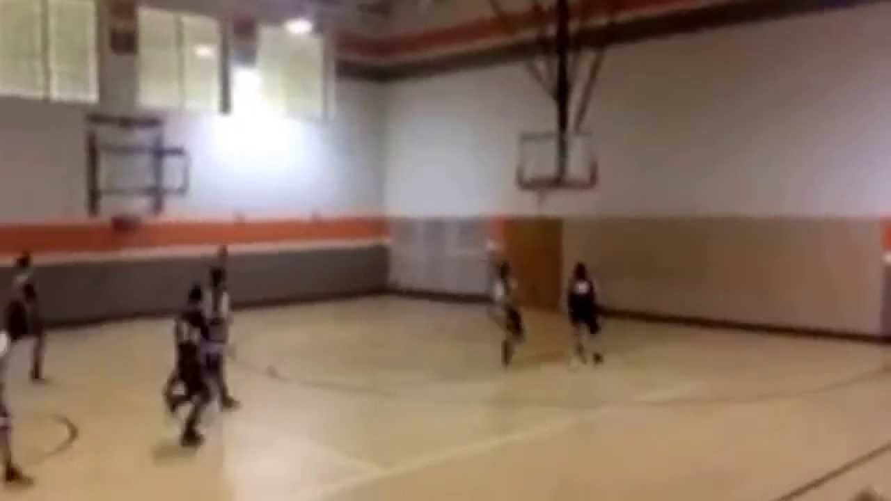 6'1 Guard Tyler Helderman Throws Down a One Handed Jam on a Defender.