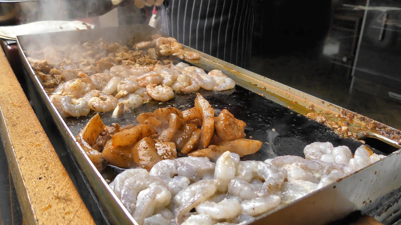 London Street Food. Shrimps and Fish Wrap Tasted in Borough Market