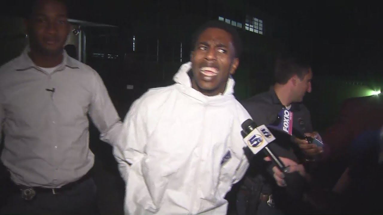 Patrick Johnson escorted to Mobile Metro Jail