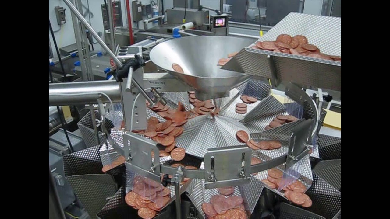 PrimoCombi&reg; multihead weigher dispensing sliced salami