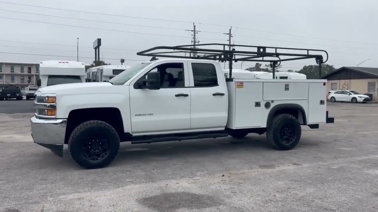2019 Chevy Silverado 2500 Double Cab 8′ Service Truck – Fixed Racks & Raptor Lining. Jobsite-Ready.