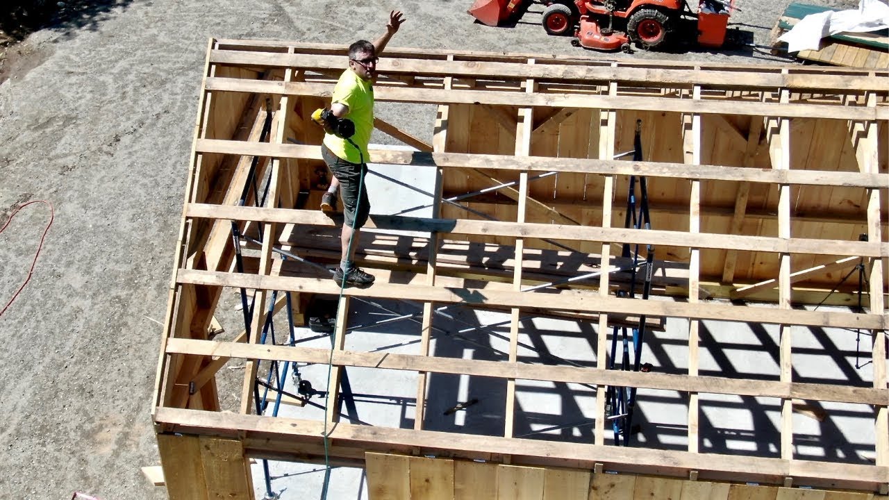 Hold on to your Britches! Things just got HAIRY ~ Strapping the Roof on the Post & Beam Barn