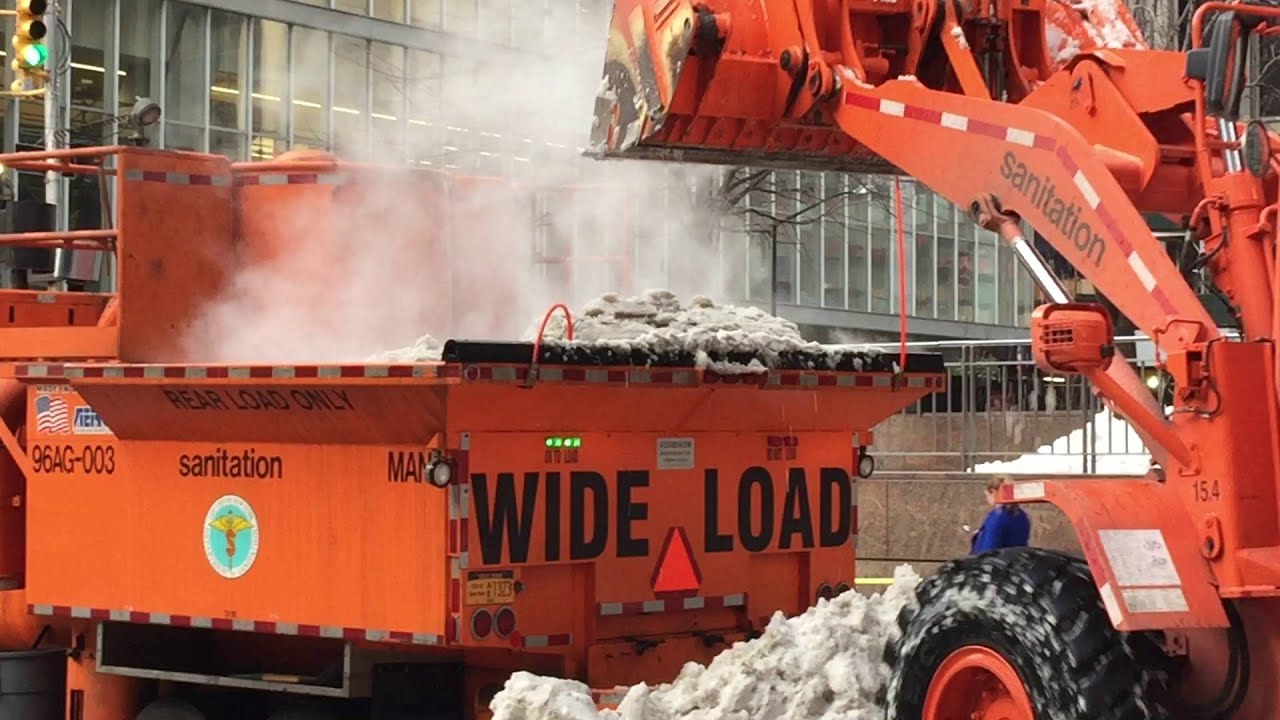 DSNY, NEW YORK CITY DEPARTMENT OF SANITATION USING FRONT LOADERS & SNOW MELTING MACHINE AFTER JONAS.