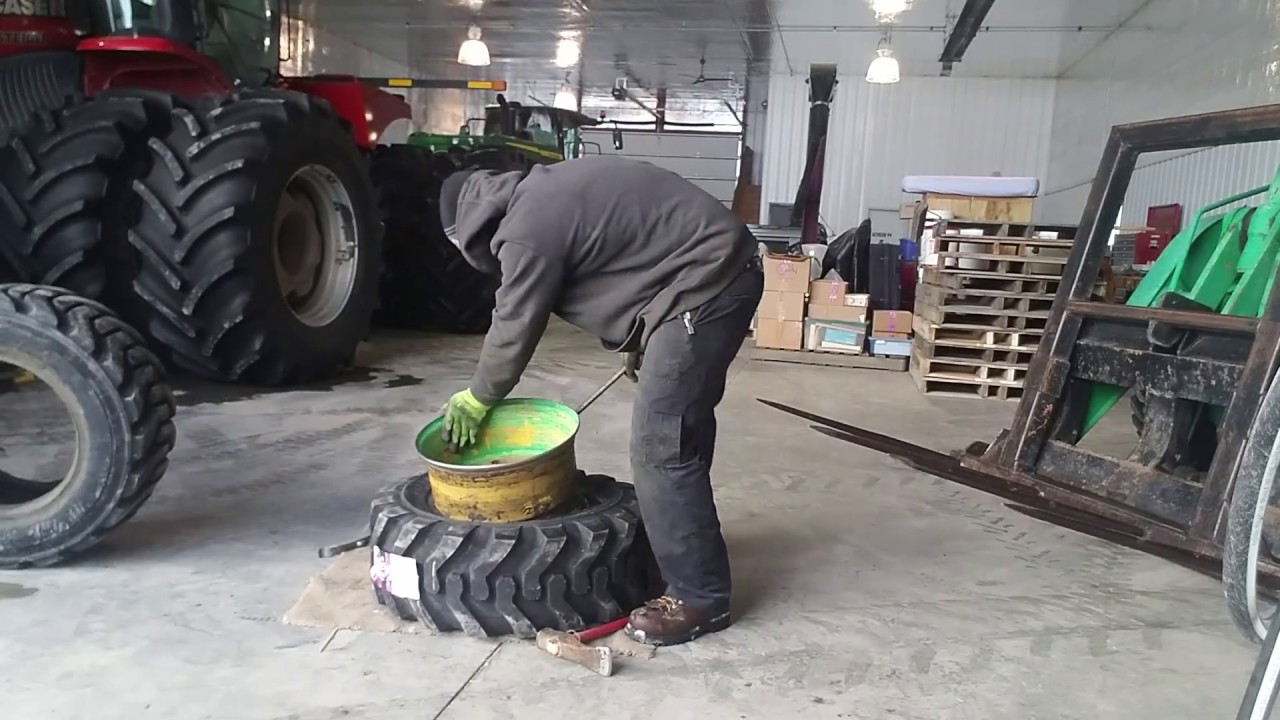 Changing a 12-16.5 front backhoe tire