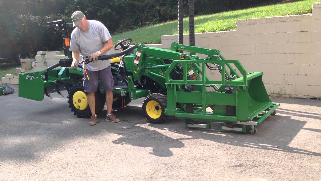 John Deere 1025R home made attachments and storage cart