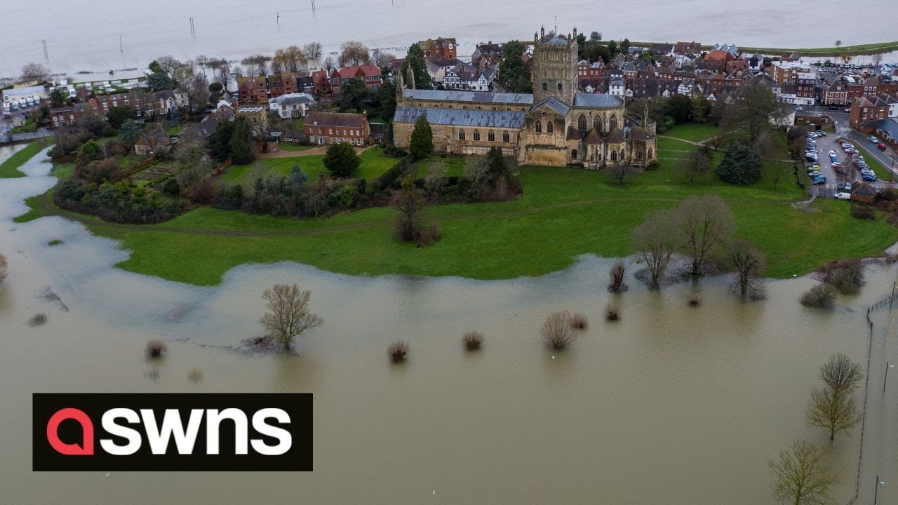 UK's Tewkesbury Abbey turned into an island as flood water streams off the Malvern Hills | SWNS