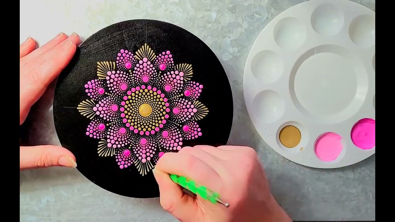 pink dot mandala painting with acrylic on wood.