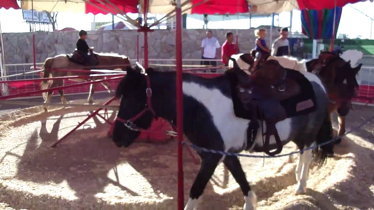 Arizona state fair 2010 - Kids riding real ponies