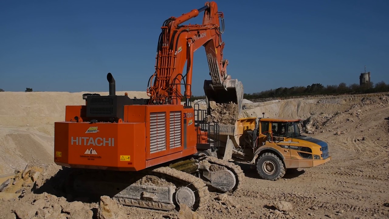 Hitachi EX1200 loading Volvo A30G