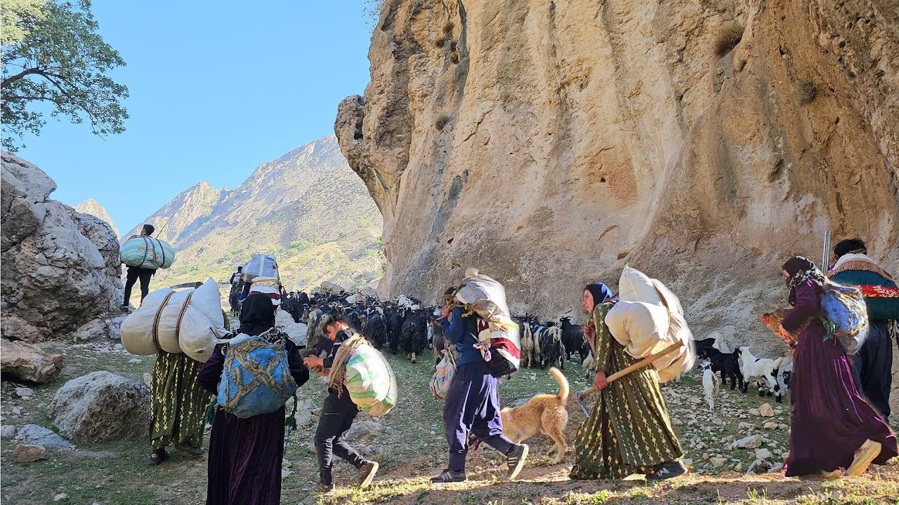 Migration of a large nomadic family through difficult and  🏞️🚶