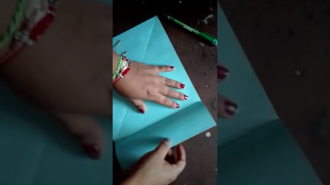 Construcción de triángulo Isósceles con papiroflexia