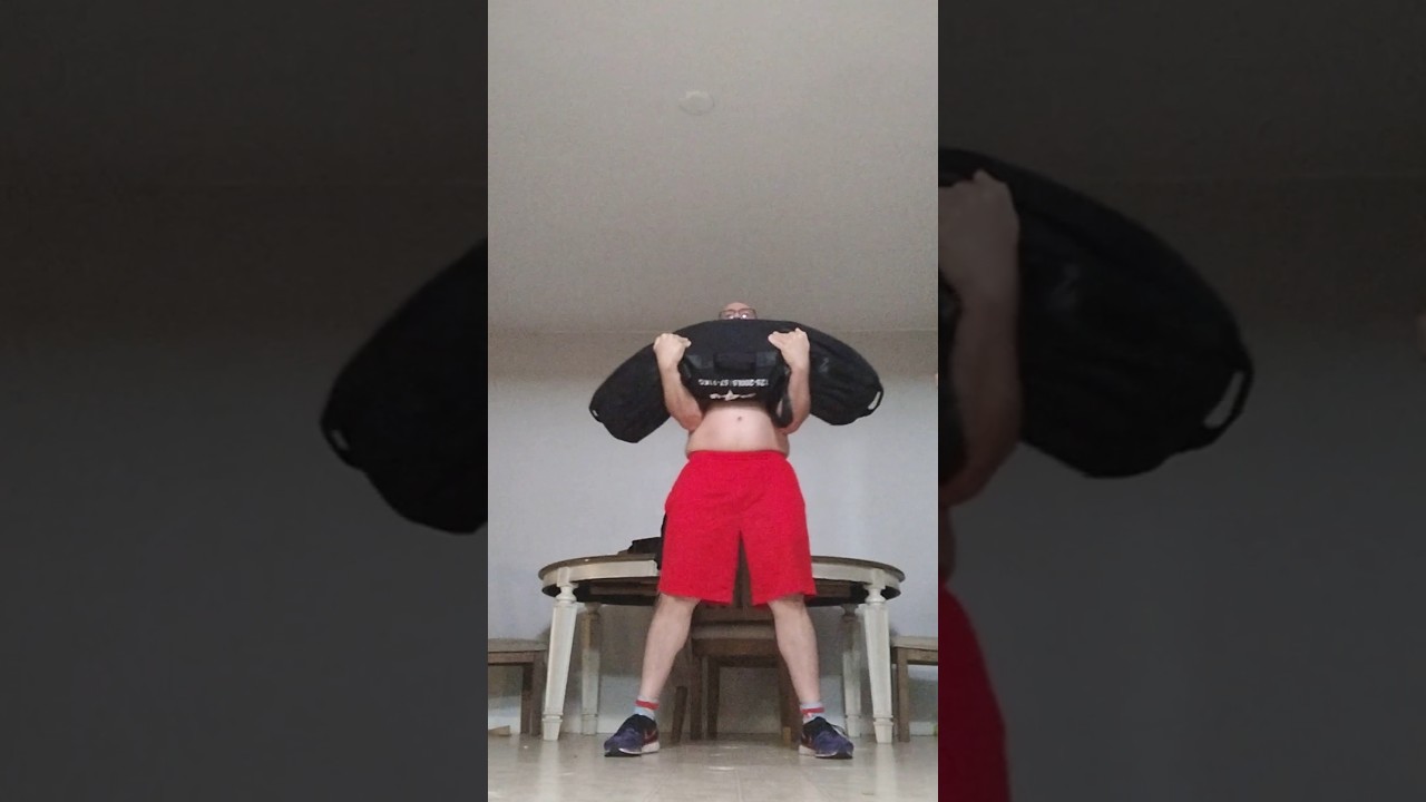 Sandbag to Shoulders into Squat (5 sets) 