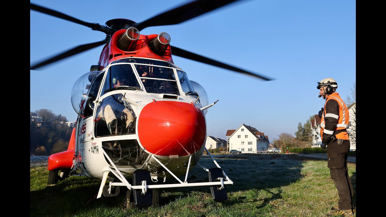 Super Puma helicopter Heliswiss International   tree removal along a railway line